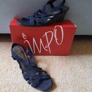 Black strappy wedge sandals